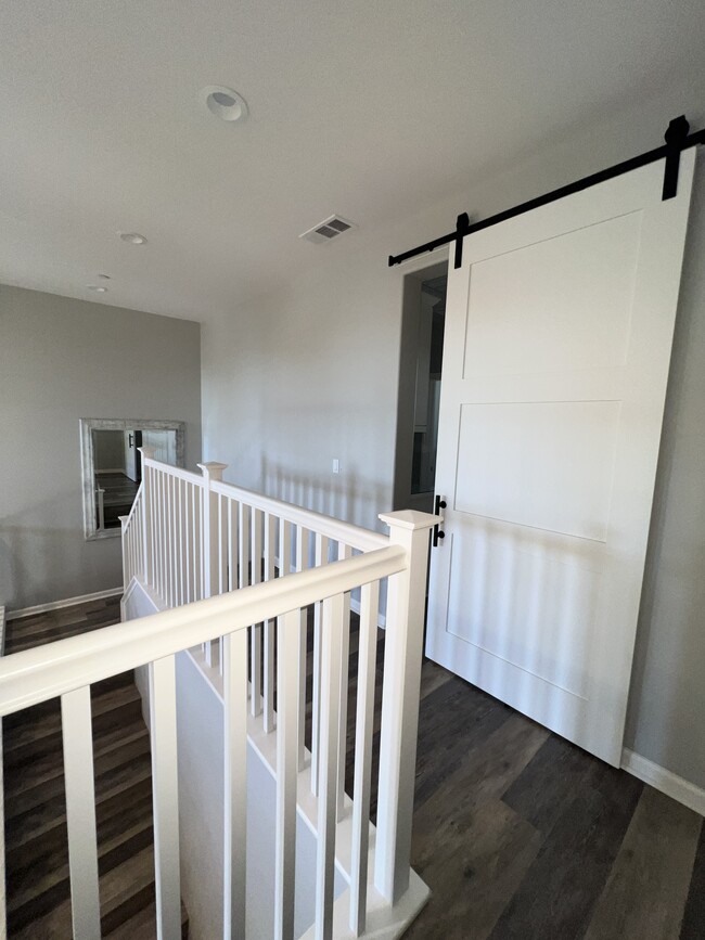 Dividing door to laundry room and bedrooms 2 and 3 - 64 Jaripol Cir