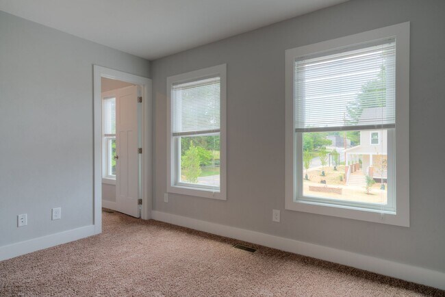 Building Photo - Private Bedroom in a Shared Two-Bedroom In Uptown Village
