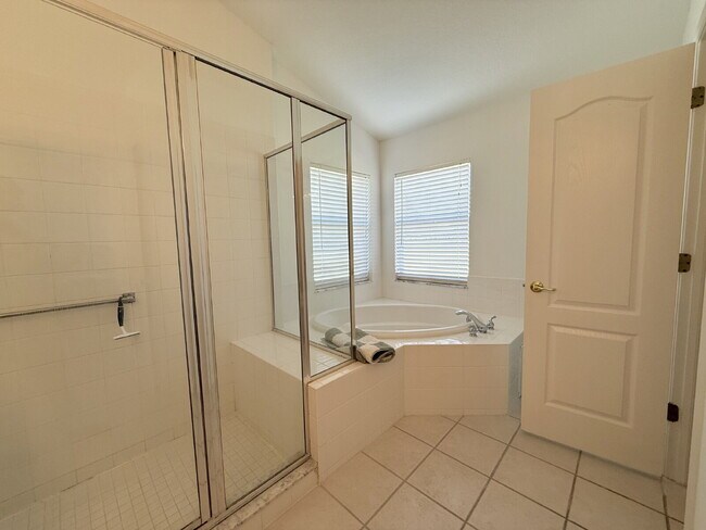 Building Photo - "Charming 3-Bed Oasis with 2 Full Baths in...