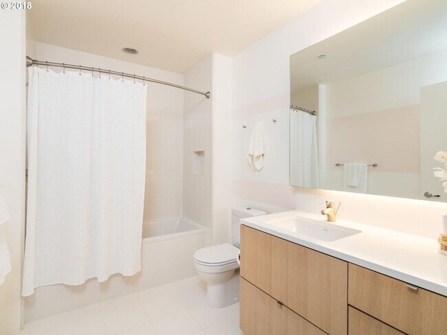 Building Photo - MOVE IN SPECIAL: $500 OFF! Stunning Condo ...