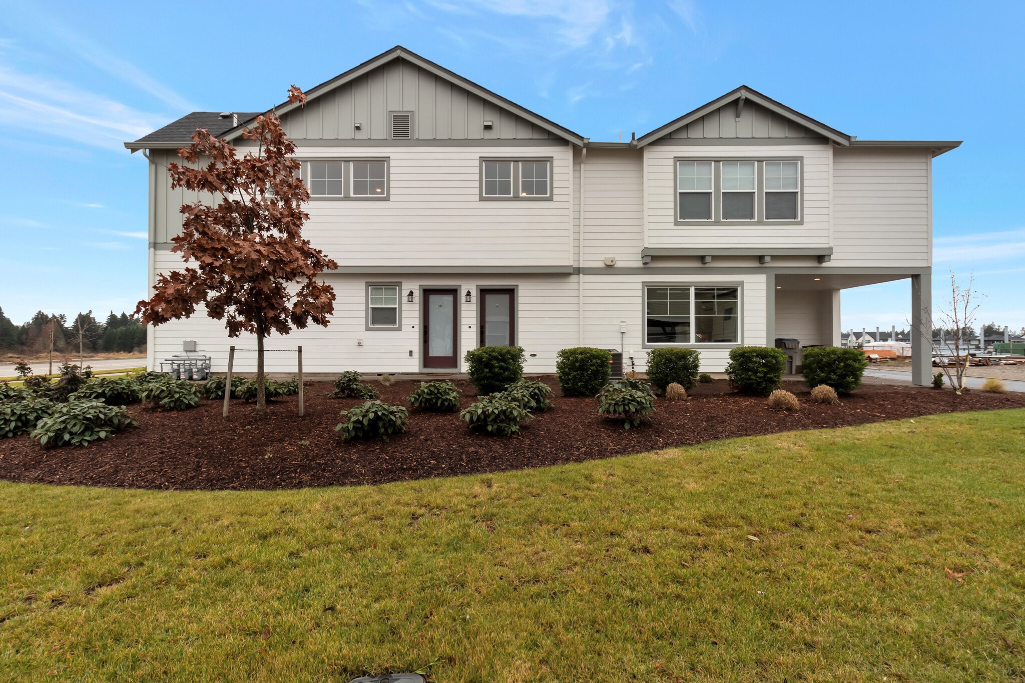 Multiunit building with windows to green space - 7471 SE Kinnaman St