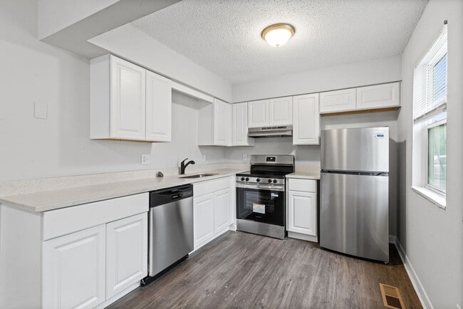 Building Photo - Summer Special! Spacious 3BR Townhome with New Upgrades + $250 Off First Month’s Rent