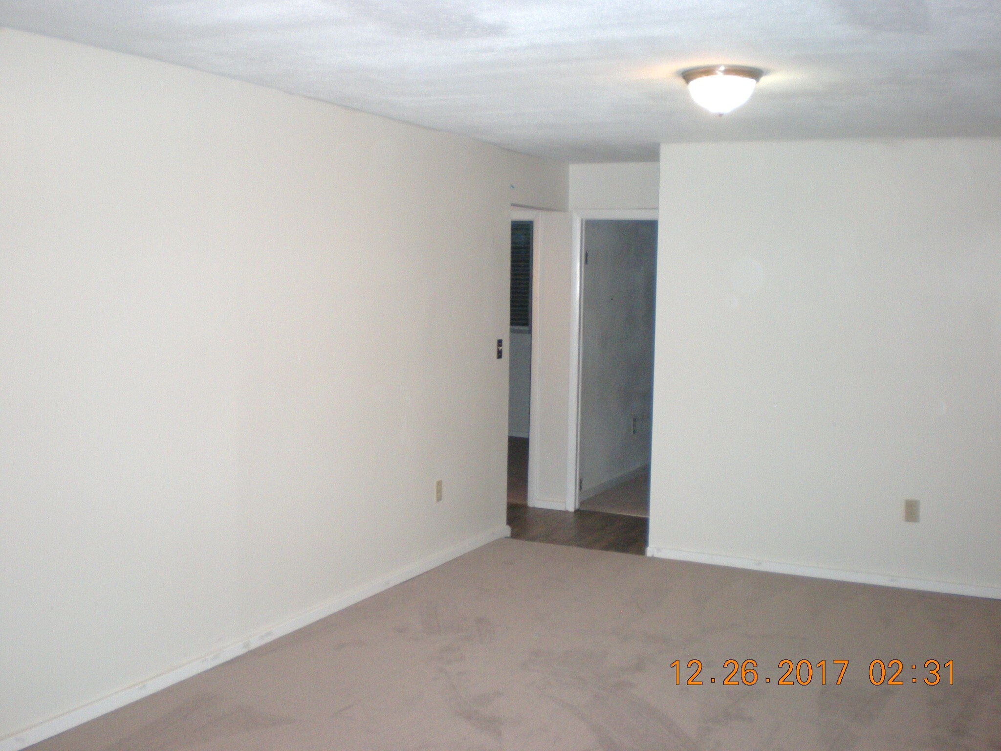 LARGE lower level family room with new carpet and paint - 1160 Clinton St