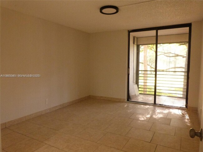 Building Photo - 6751 N University Dr