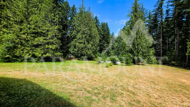 Building Photo - Spacious Log Home with Acreage!