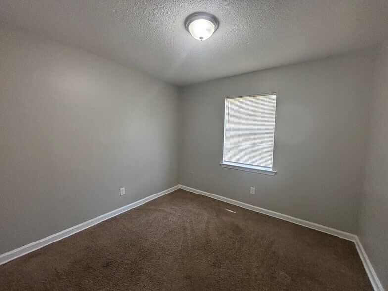 Building Photo - 5203 Black Diamond Cove