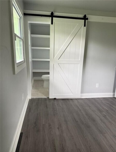 1/2 bathroom in one of the 3 bedrooms - 2405 Cross St NW