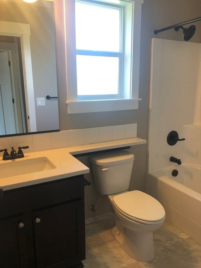 Building Photo - Beautiful New Home with Garage and Yard! A...