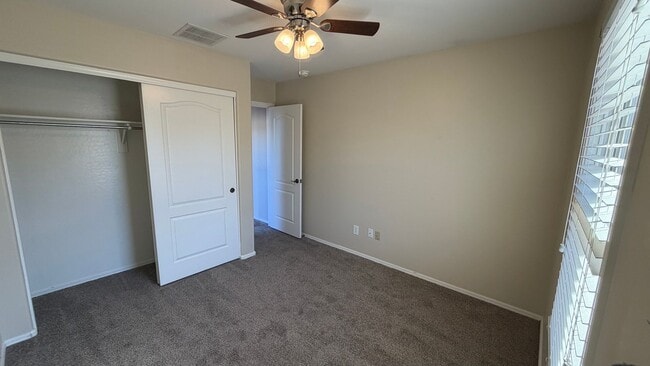 Building Photo - Spacious Surprise home with large backyard