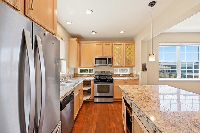 Building Photo - $2,640.95 -  3 Bed, 2.5 Bath Townhome in Denver with Attached Garage and Central AC!