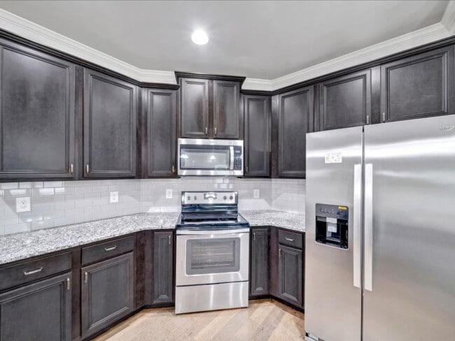 Building Photo - Spacious 4BR Home with Fenced Yard & Community Pool
