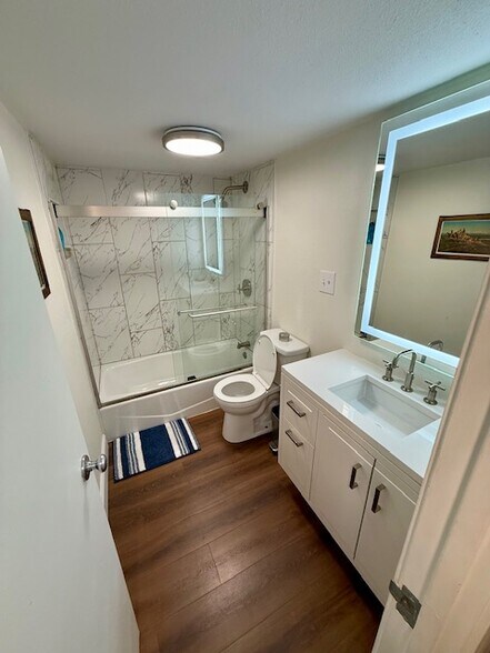 ensuite primary bathroom. - 777 N Washington St