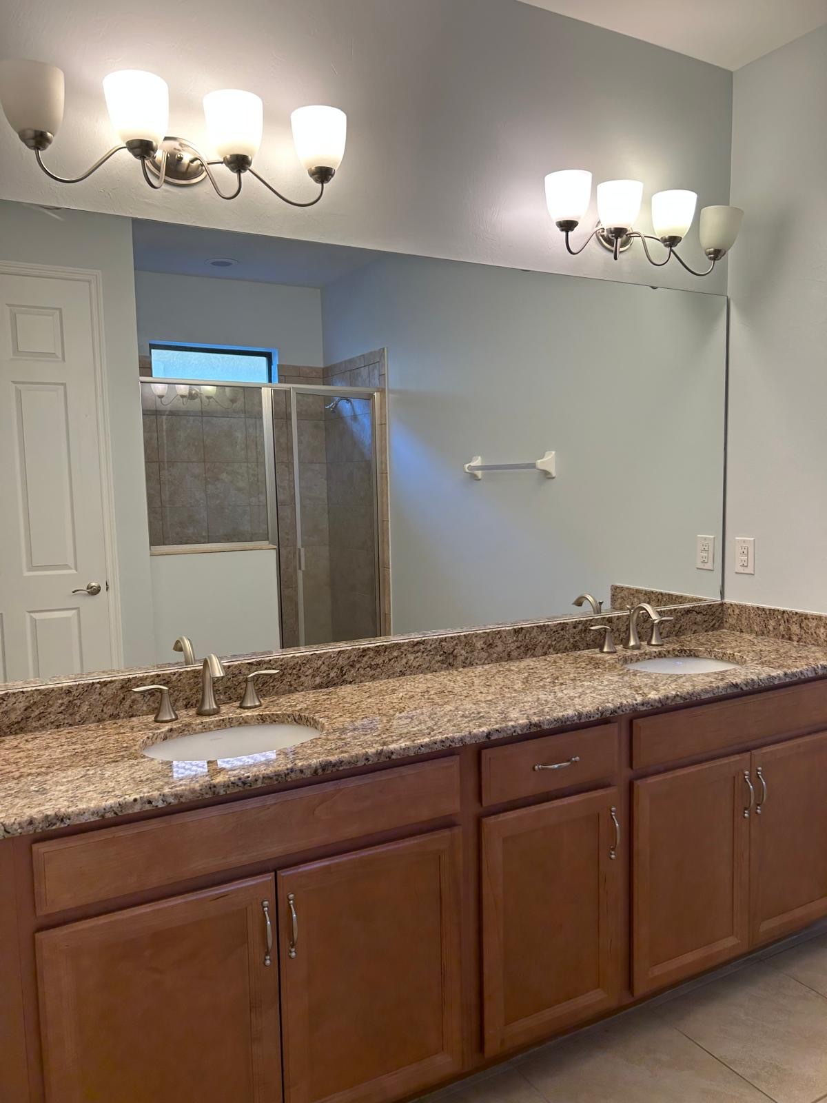 Masterbathroom with double sink, shower and apart toilet - 14529 Tuscany Pointe Trl