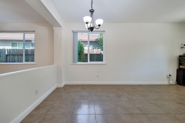 Building Photo - Spacious 4-Bedroom Home, Beautifully Maint...