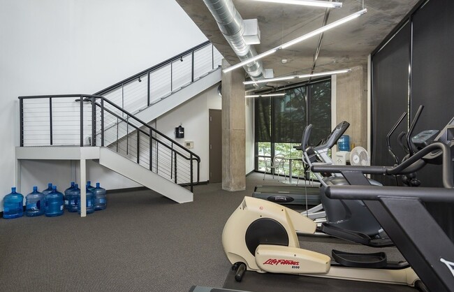 Building Photo - 1/2 Month FREE: Rare Streetcar Lofts Gem w/ Parking & Utilities