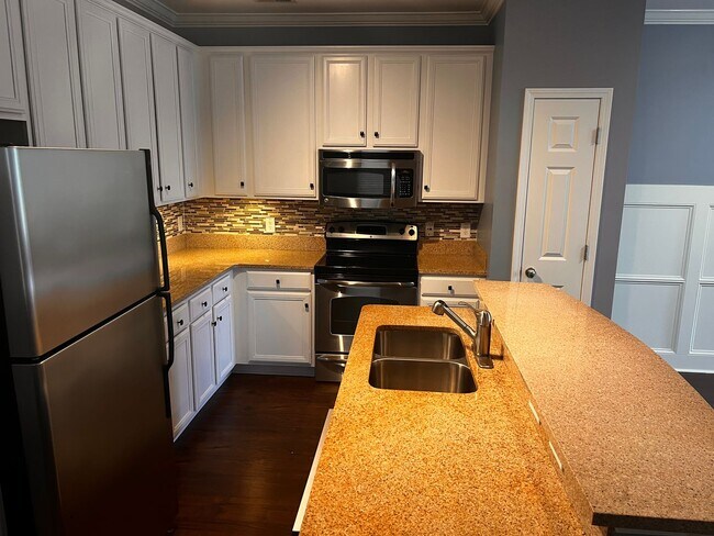 Building Photo - Now Available! Luxury three-bedroom townhome in St. James Square in Myrtle Beach.
