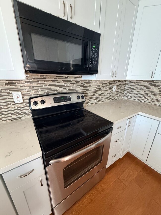 Building Photo - **Coming Soon — Spacious 3BR + 2.5BA Two-Level Condo in Pointe Pacific**