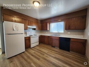 Building Photo - 2-Bedroom, 1-Bathroom Upper-Level Apartmen...