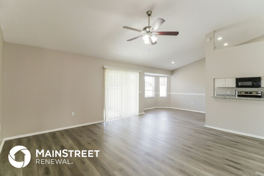 Building Photo - 7465 Jessamine Dr