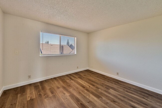 Building Photo - 3 Bedroom Home with Fireplace and LVP Flooring & 2-Car Garage!