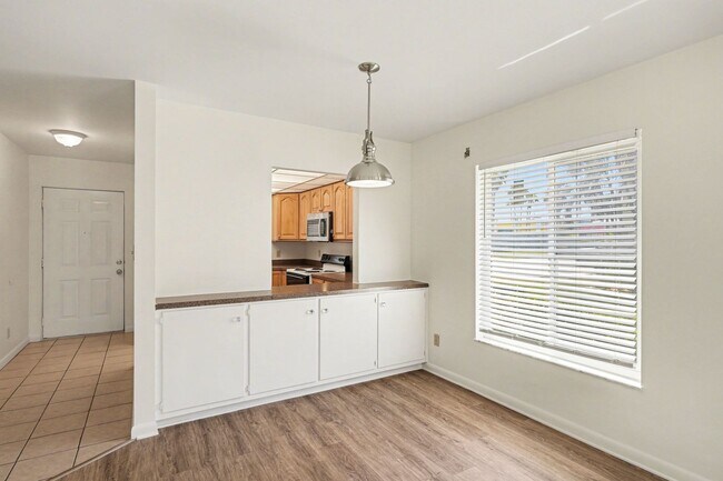 Building Photo - Must see 1st floor, end unit with lots of natural light in St Lucie Gardens.