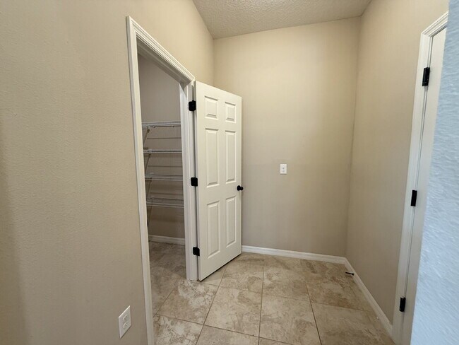 Building Photo - Spacious 4-Bedroom Retreat with additional office/den in the Heart of Trinity!