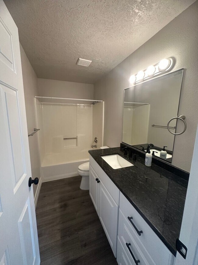 Building Photo - Quiet neighborhood, 3 bedroom, 2 bath home, huge front patio/deck, RV parking!