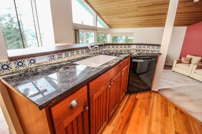 Building Photo - Spacious 4-Bedroom Home with Stunning Lake...