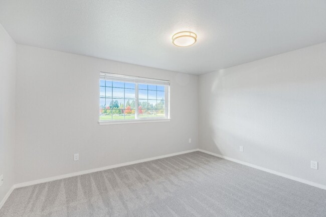 Building Photo - Recently updated 3 bdrm, 2 bath. Attached garage. Wrap around yard. Private upstairs bedroom and ...