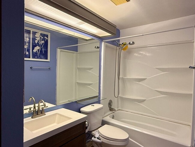 Building Photo - Open Tri-Level Townhome With Tons Of Space...