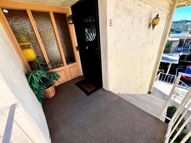 Front door (security gate for fresh air)h - 6824 Hyde Park Dr