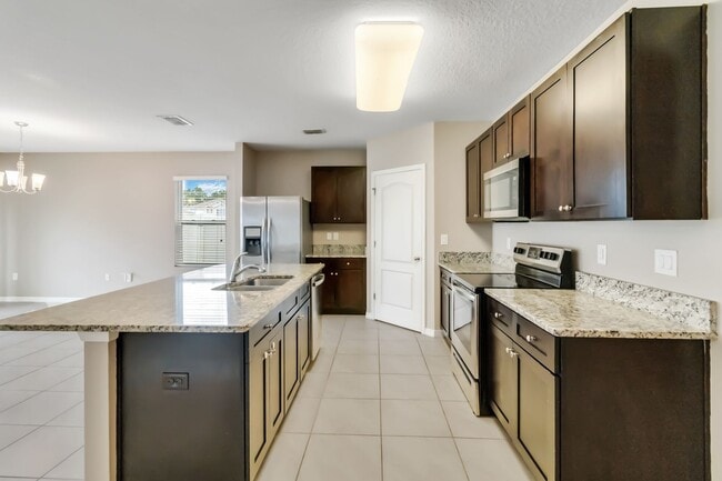 Building Photo - Beautiful 4/2 Energy Efficient Home in St. Cloud w/ Fully Fenced Yard