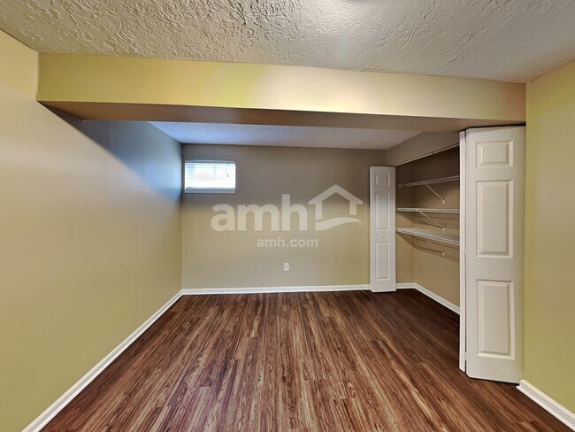 Building Photo - 6312 Satin Wood Dr