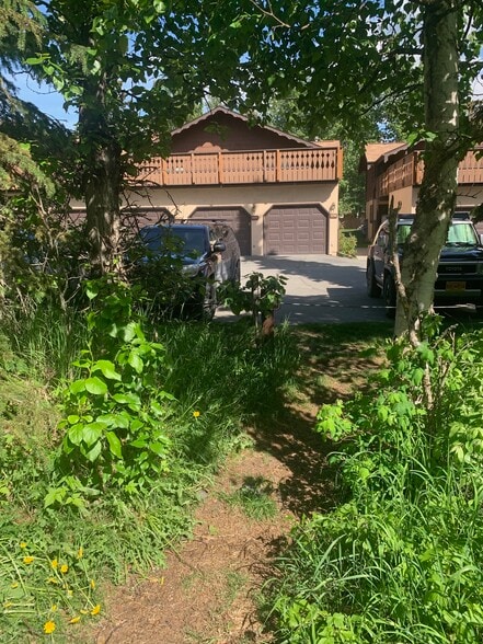 Back Condo toward trails - 4806 Mills Dr