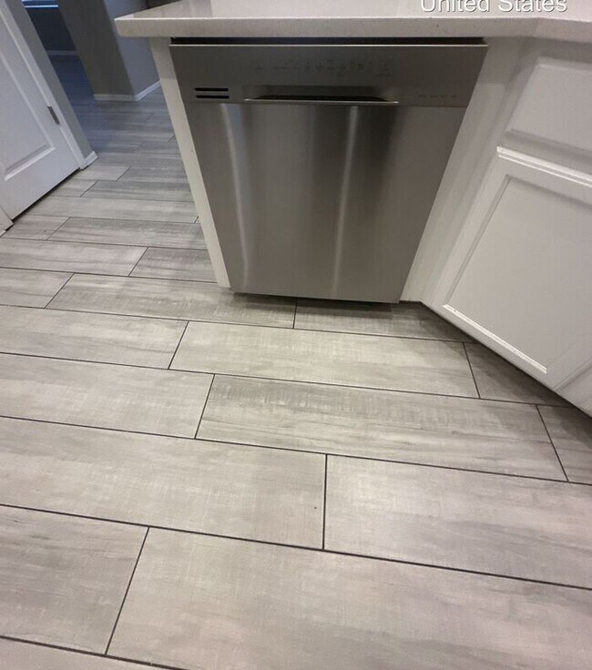 Building Photo - REMODELED single level home with 3 car gar...