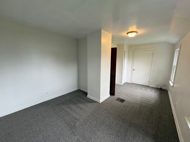 Building Photo - Three bedroom one bathroom 2 story home for rent