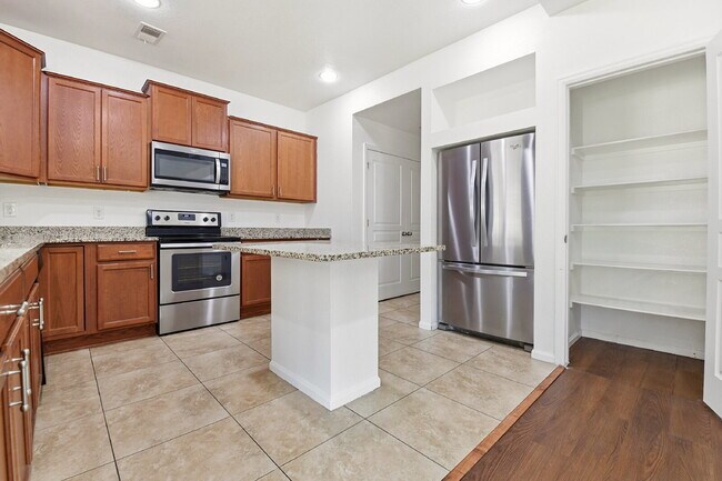 Building Photo - $2,940.95 - 4 Bed, 3 Bath Home in Denver with Central A/C and Fenced in Yard!