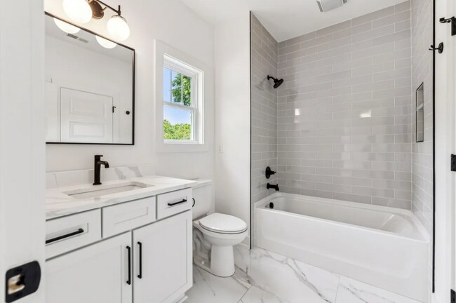 Building Photo - The Nations | Rooftop Balcony + Private Yard