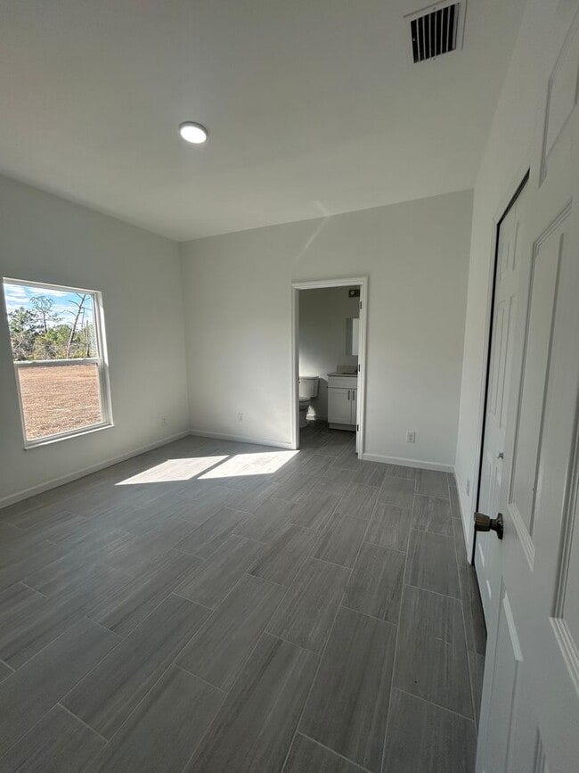 Building Photo - Brand-New Modern 2BR/2BA Home with Garage- In Serene Lake Placid Location