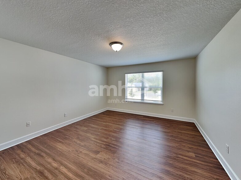 Building Photo - 6607 Hidden Rose Pl