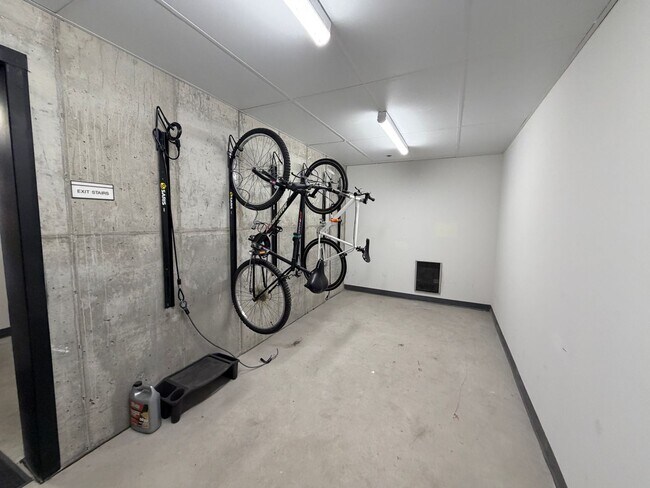 Building Photo - Top-Floor Corner Condo with Downtown Views — Stylish, Pristine, and Steps From Everything