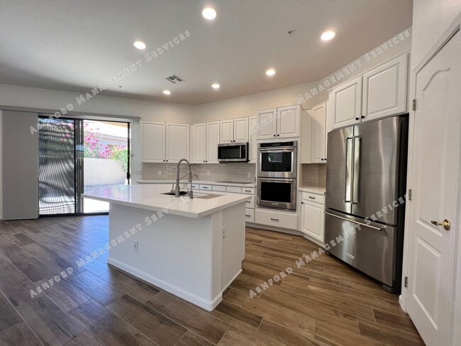 Building Photo - COME HOME TO LUXURY IN GATED GRAYHAWK GOLF...