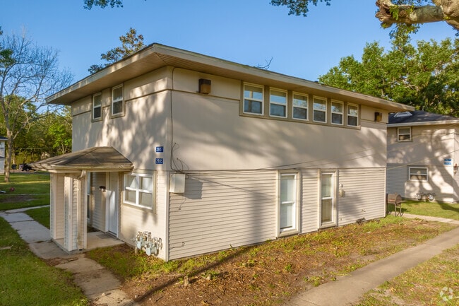 Apartment Buildings With Landscaped Areas and Sidewalks - Gilmore Park Apartments