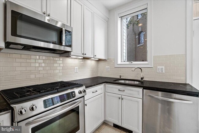 Building Photo - 2355 Ashmead Pl NW