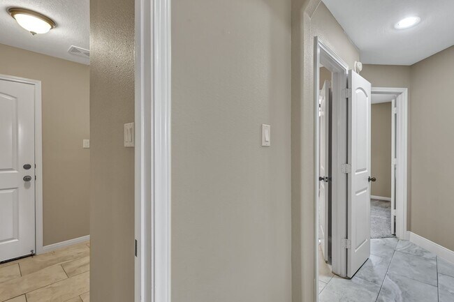 Building Photo - One story, and a 3-car garage!