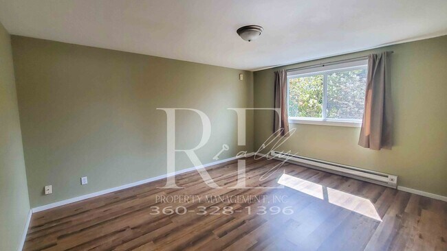 Building Photo - Modern Manette 1BR Condo with Private Pati...