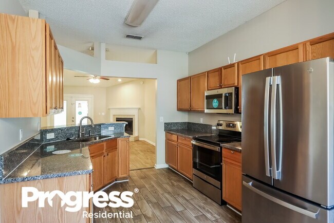 Building Photo - 7637 Invermere Blvd N