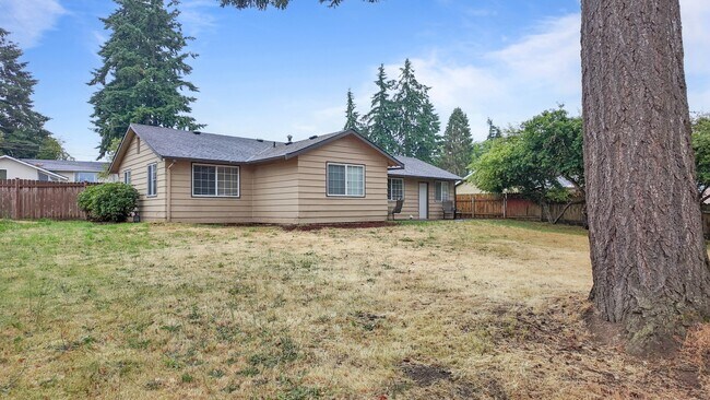 Building Photo - Charming 3BR Home with Massive Fenced in Yard