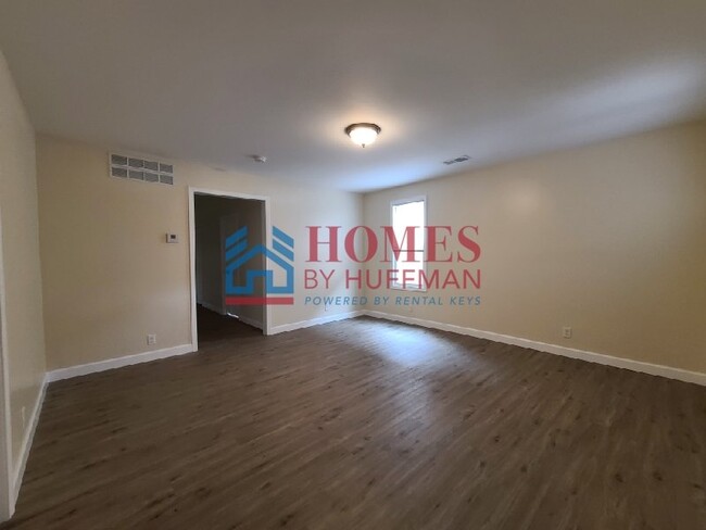 Building Photo - Downstairs | Three Bedroom Duplex