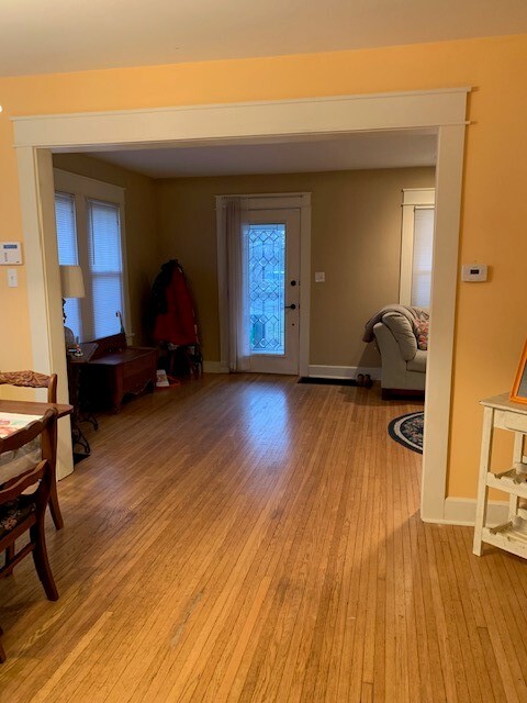 Standing in the dining room, looking at the front door. Living room to the right in this picture. - 704 W Cherokee Dr